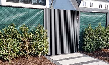 Aluminium schuifpoort met looppoort - Antwerpen